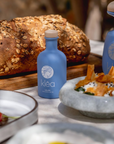 Griechisches natives Olivenöl extra Galani von Klea wird serviert zu Brot